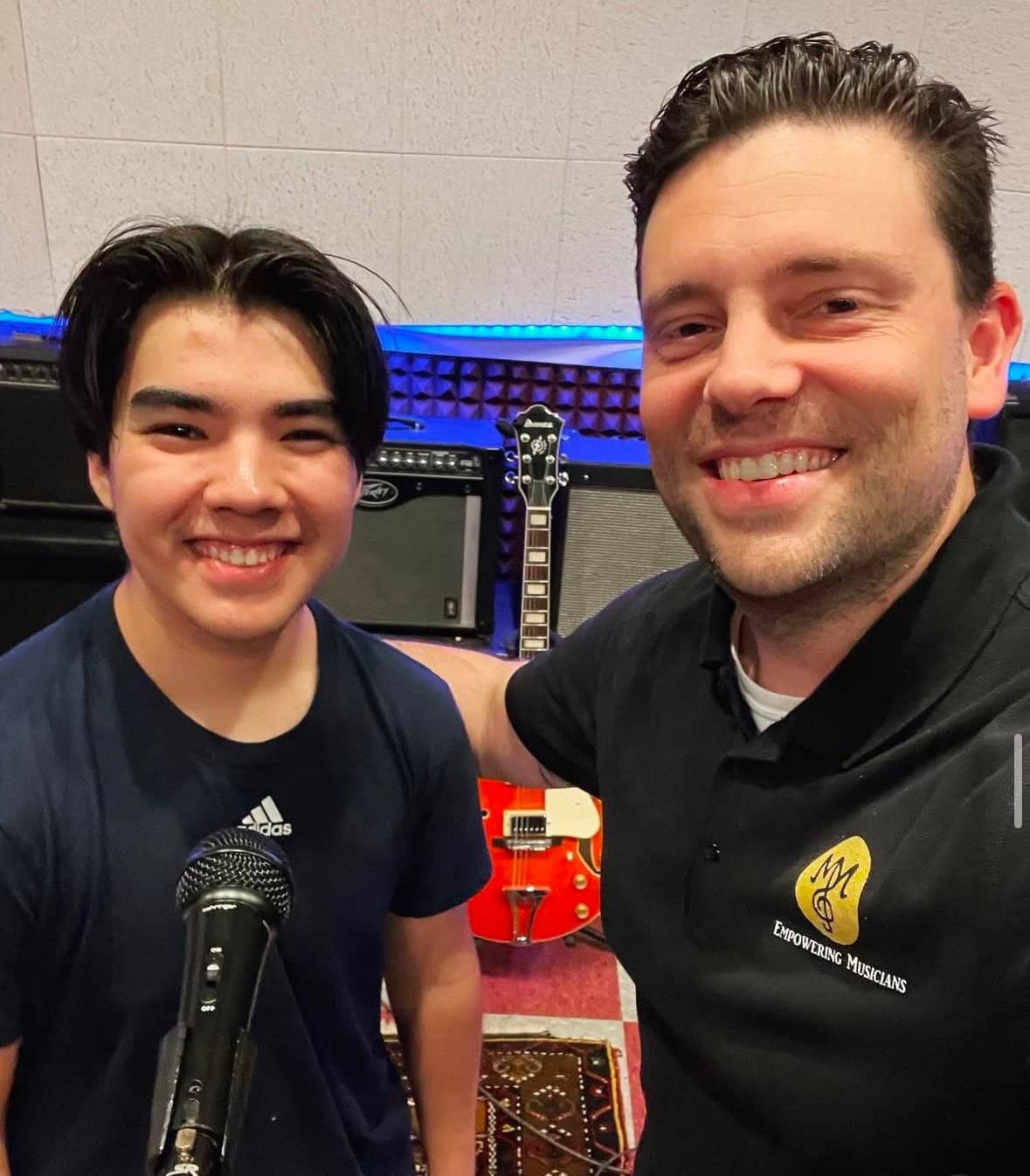 Michael Mingoia with a student at the M3 Studios recording space in Patchogue, NY